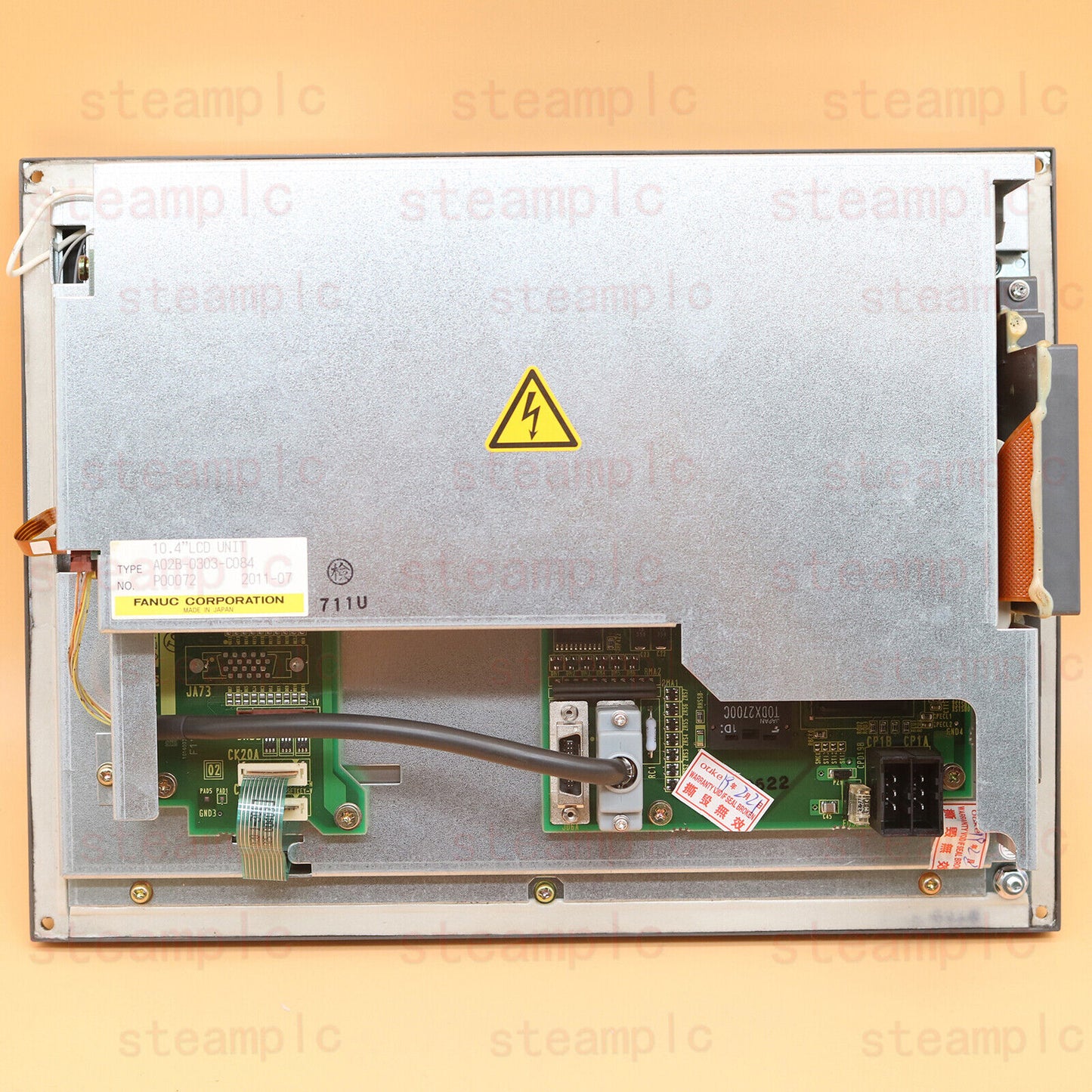 FANUC A02B-0303-C084 screen display, industrial automation part with LCD unit, electronic components visible, MADE IN JAPAN.