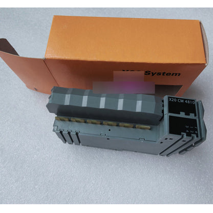 B&R X20 CM 4810 PLC module with orange box, grey module, and 'X20 System' label. For industrial automation.