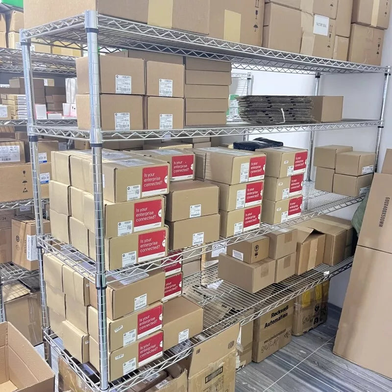 Warehouse storage of Allen-Bradley industrial automation parts, boxes labeled with "Is your enterprise connected?"