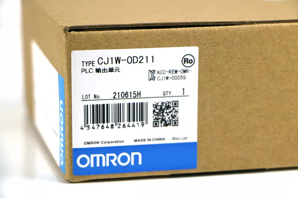 Omron CJ1W-OD211 PLC Output Unit Box, new and unopened, with visible model, barcode and Omron logo, expedited shipping