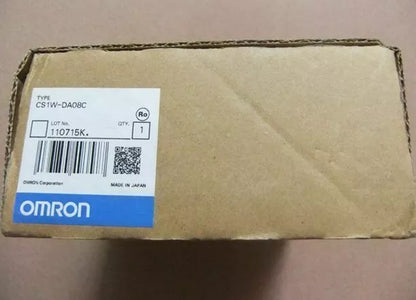 Omron CS1W-DA08C Analog Output Module box, brown cardboard, label with part number and "MADE IN JAPAN" text.