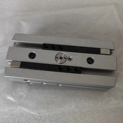 Festo HGPL-14-40-A-B Cylinder Claw, silver metal component with black accents, top view.