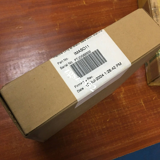 ABB IMASO11 PLC card in its original packaging, brown cardboard box with label showing part and serial numbers.