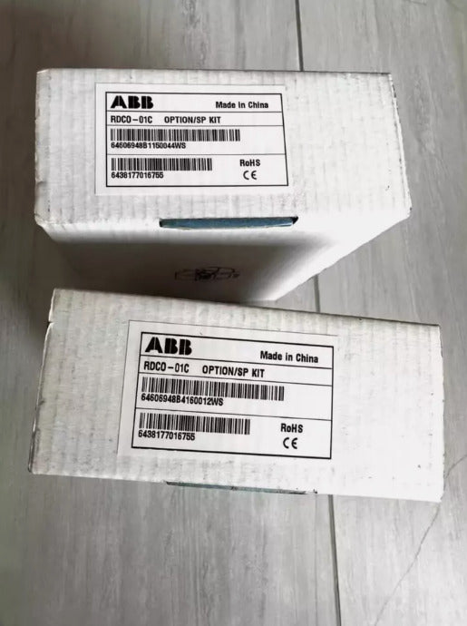 ABB RDCO-01C DDCS Communication Option Module boxes, showing product details and labels.