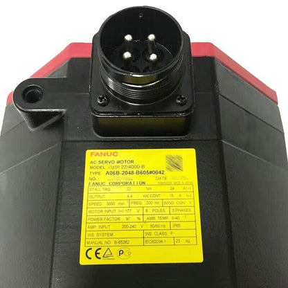 FANUC A06B-2048-B605#0042 Servo Motor, industrial automation part with label, black and red.