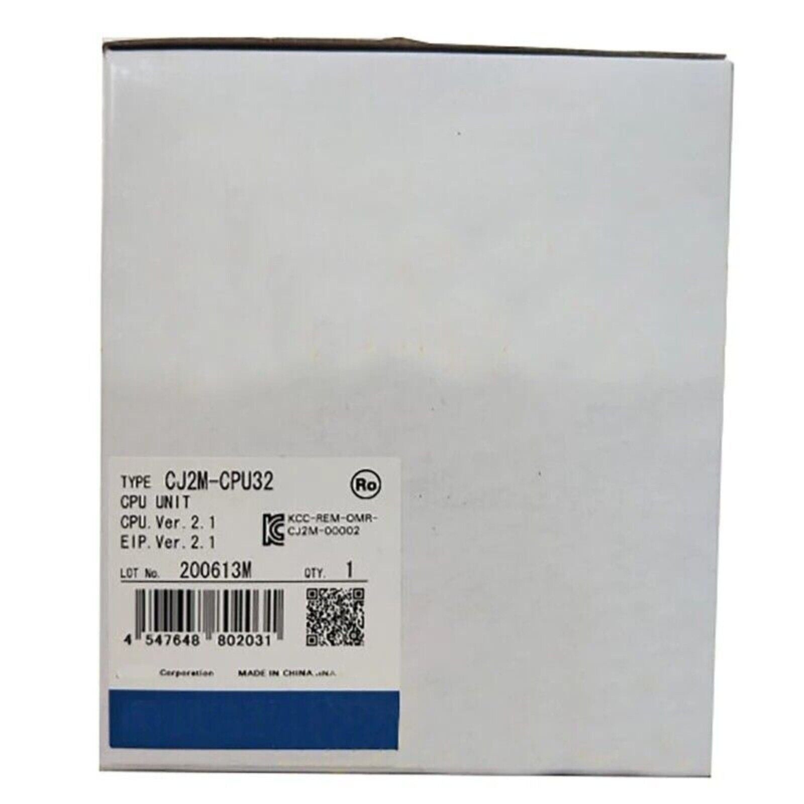 Omron CJ2M-CPU32 PLC Module in box, showing product information and labels.