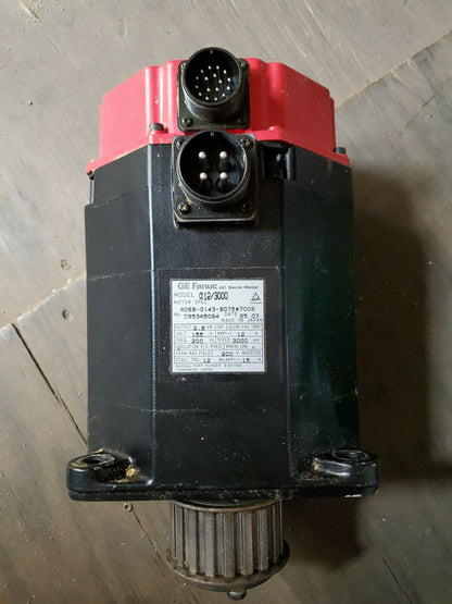 FANUC A06B-0143-B075#7008 AC Servo Motor, industrial automation part, black and red with connectors