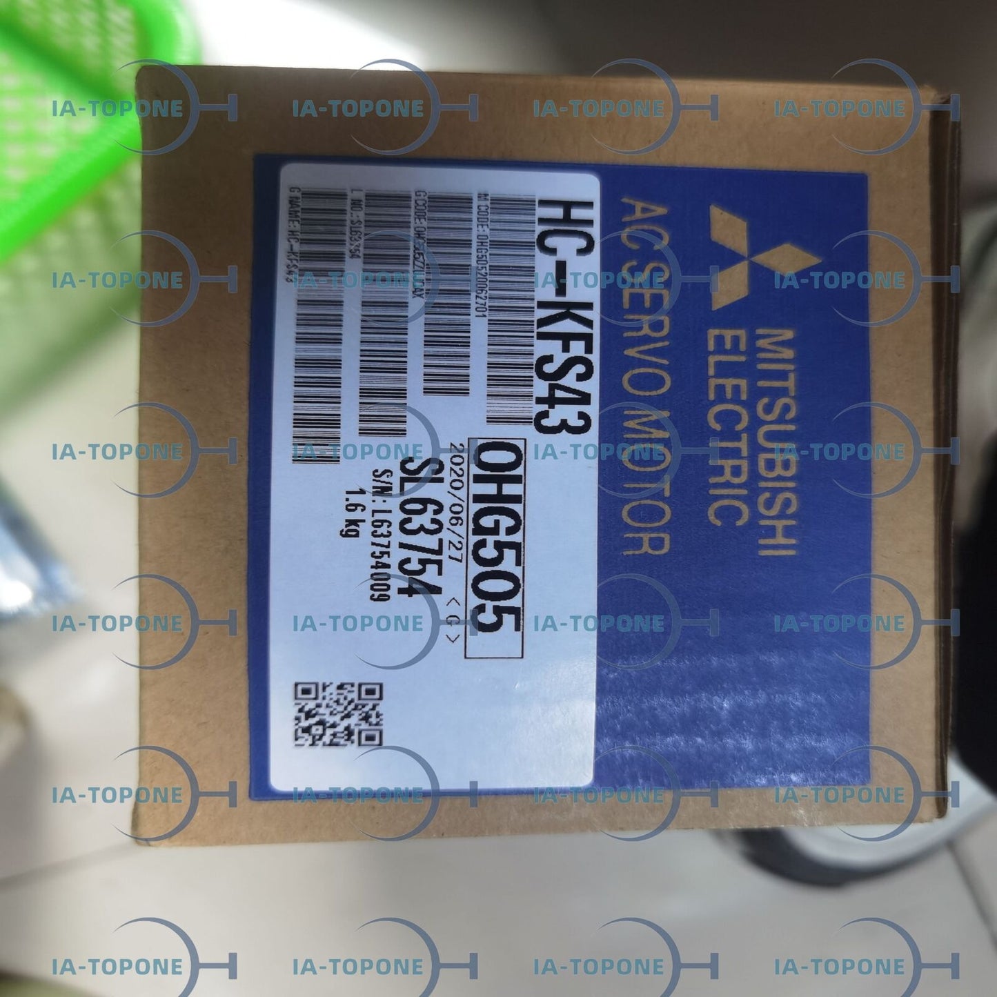 Mitsubishi HC-KFS43 AC Servo Motor with Serial Number SL63754 and OHG505 code on packaging
