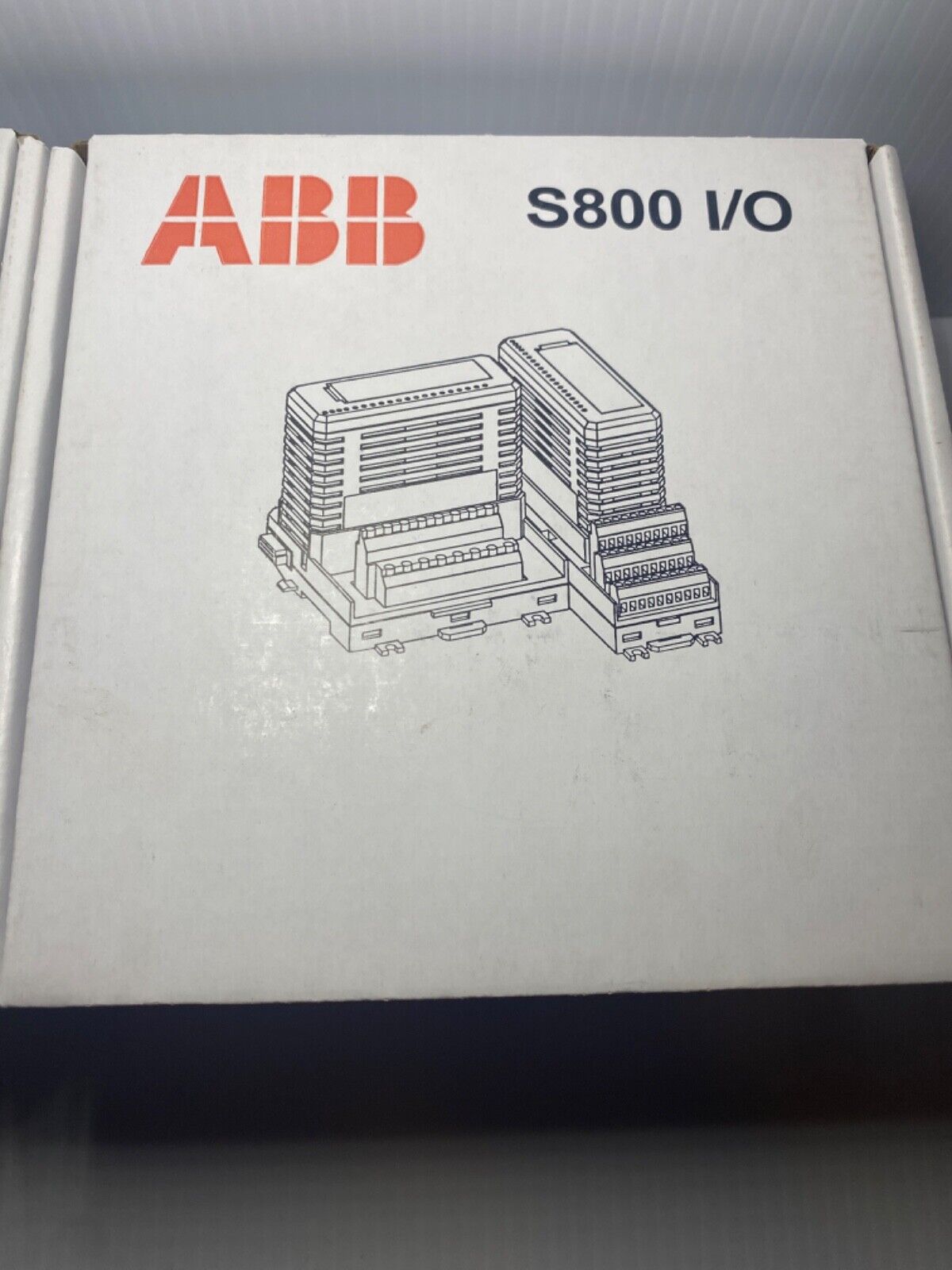ABB S800 I/O Analog Input Module box, PLC automation equipment, white background.