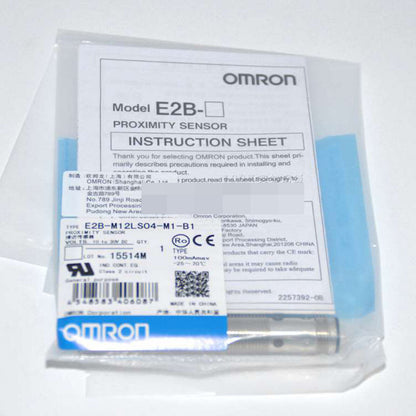 Omron E2B-M12LS04-M1-B1 Proximity Sensor in packaging with instruction sheet