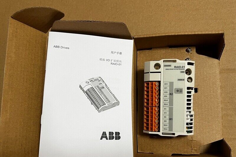 ABB RAIO-01 Analog I/O EXTENS module in its box, with manual. Industrial automation part.