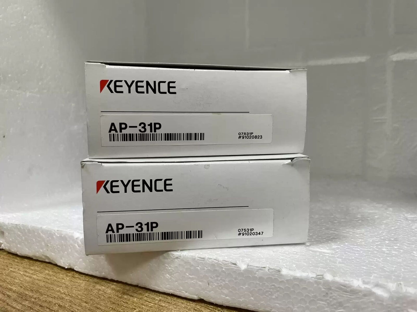KEYENCE AP-31P sensor boxes, industrial automation parts.