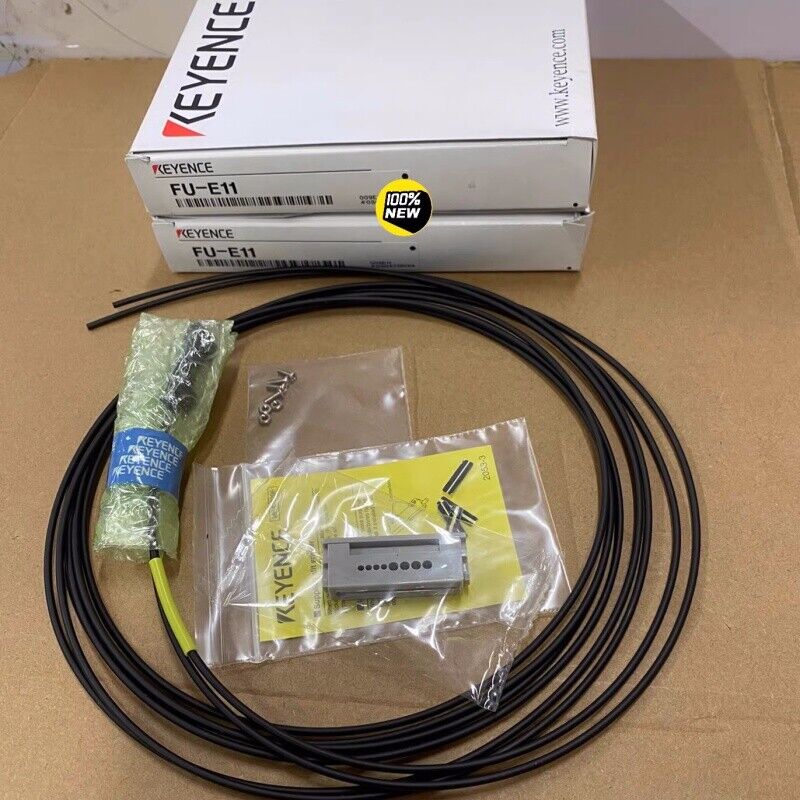 Keyence FU-E11 Fiber Optic Sensor with components, new condition, in original packaging.