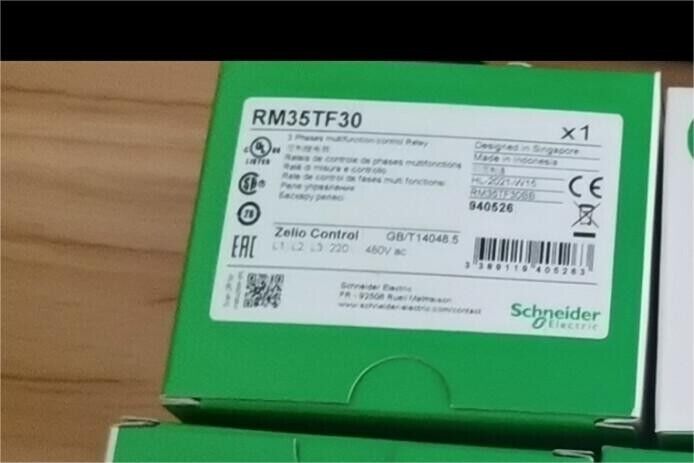 Schneider Electric RM35TF30 3-phase multifunction control relay, new in box. Zelio Control.