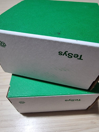 TeSys control unit packaging, green and white box, industrial automation part