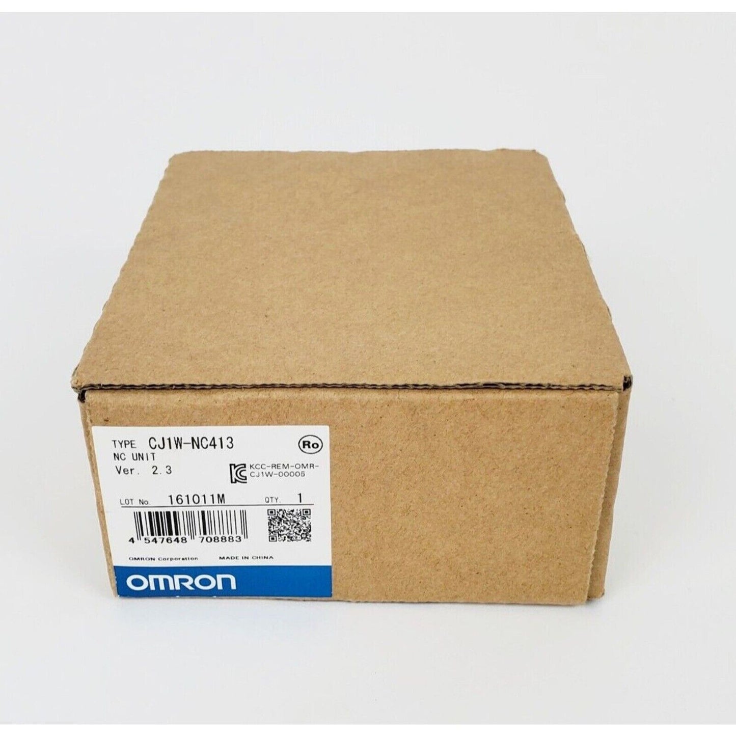 Omron CJ1W-NC413 PLC Module in box. PLC module for industrial automation.