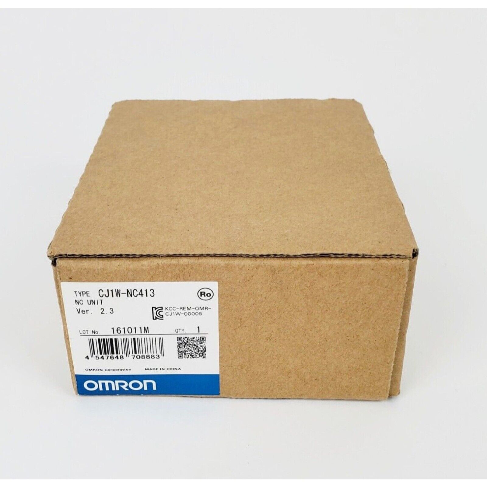 Omron CJ1W-NC413 PLC Module in box. PLC module for industrial automation.