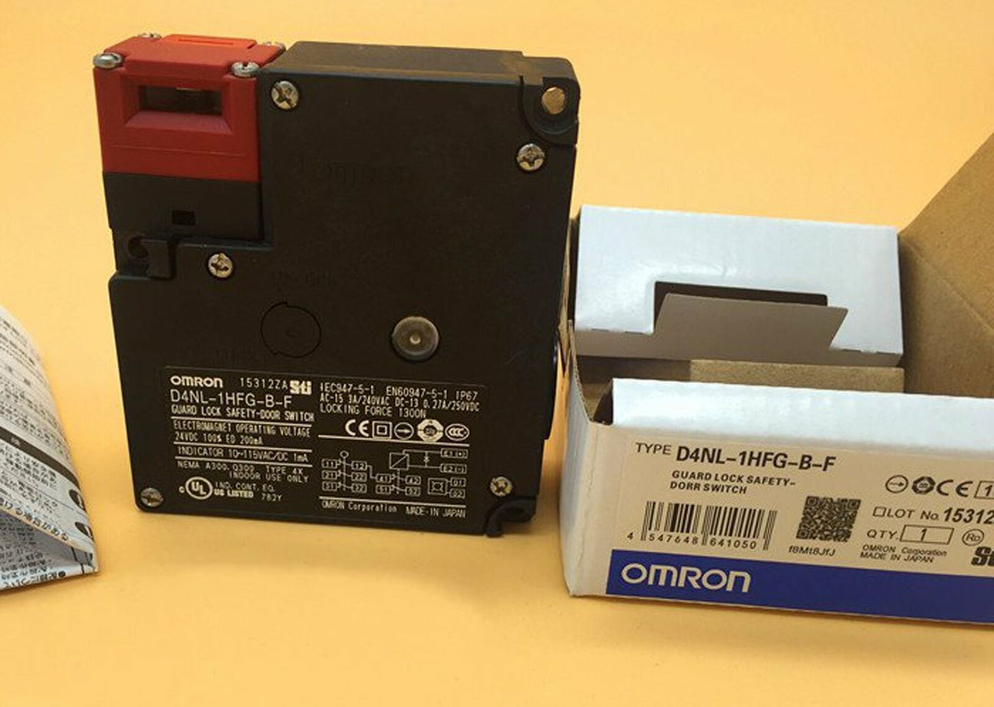 Omron D4NL-1HFG-B-F safety door switch, black and red design with box, industrial automation component