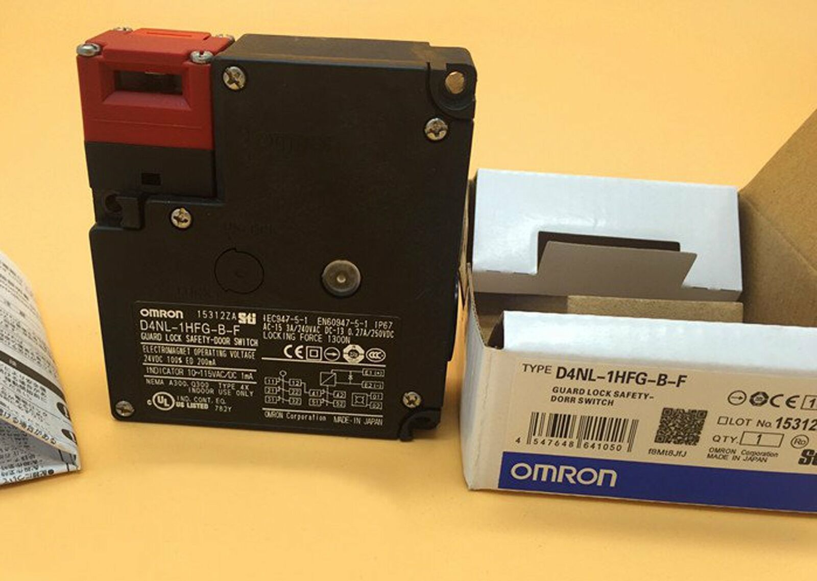 Omron D4NL-1HFG-B-F safety door switch, black and red design with box, industrial automation component