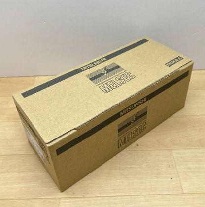 Mitsubishi FX3U-64MR/ES Programmable Logic Controller in its original box. MELSEC PLC for industrial automation.