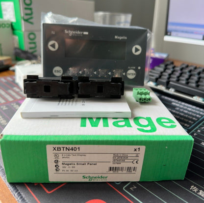 Schneider Electric Magelis XBTN401 HMI panel, 4-line text display, 24VDC, with connectors and packaging