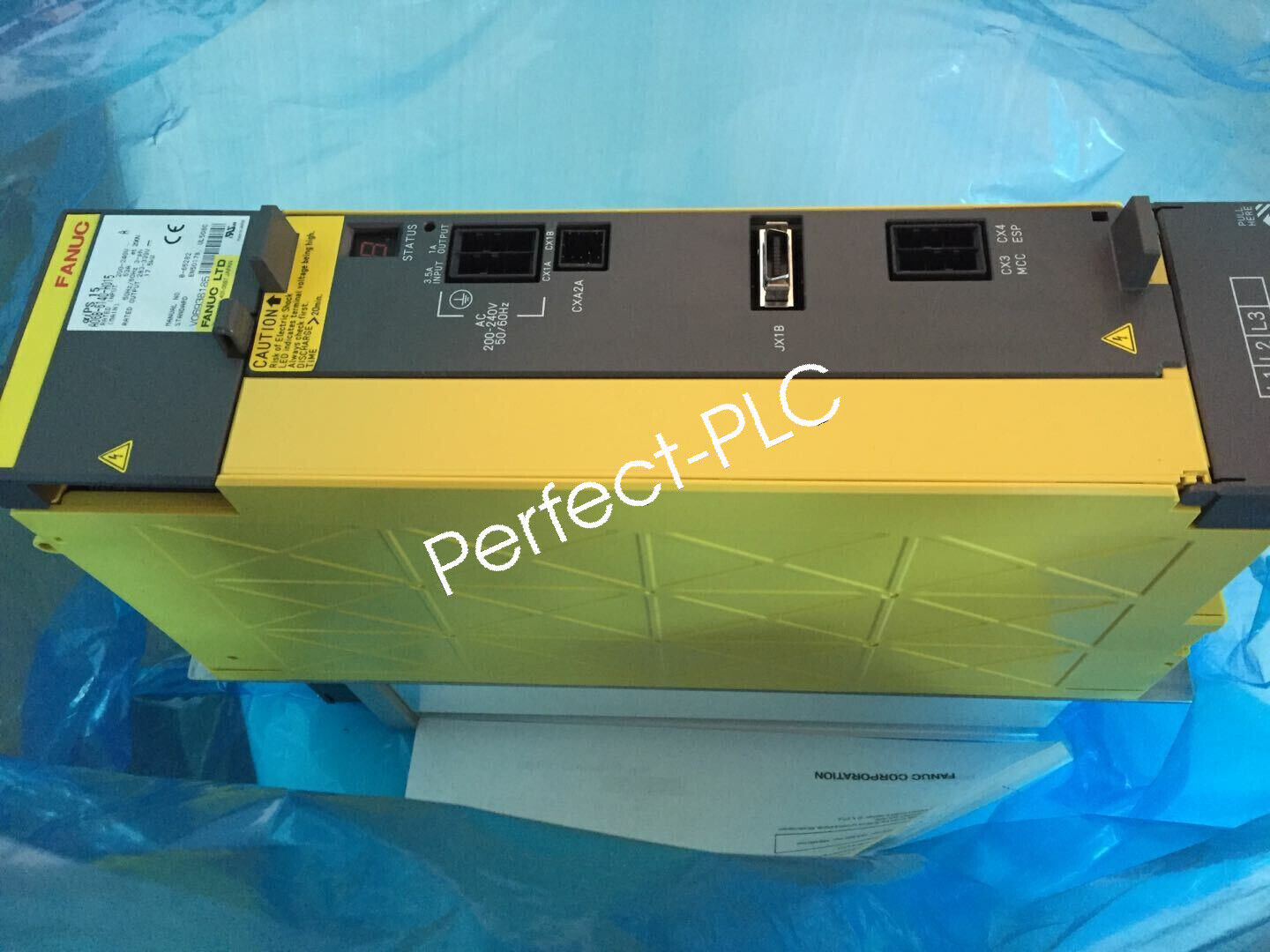 FANUC A06B-6140-H015 Servo Driver, yellow and gray casing, angled view, Perfect-PLC