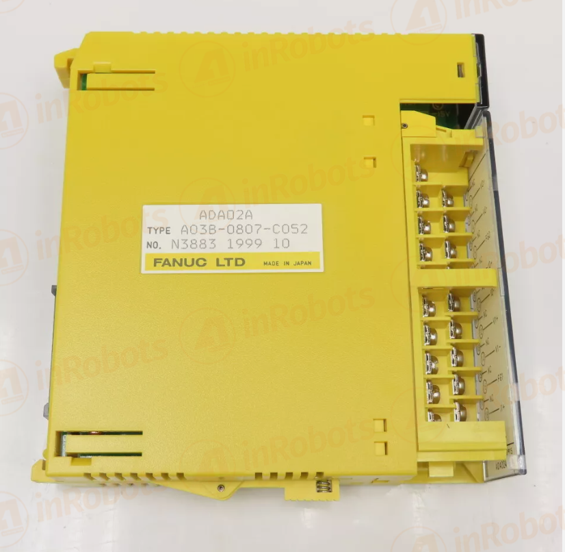 FANUC A03B-0807-C052 ADA02A Analog Output Module. Yellow PLC module with label detail.
