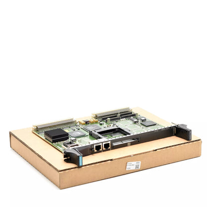 Siemens SIMATIC TDC CPU551 processor module on cardboard box, industrial automation part.
