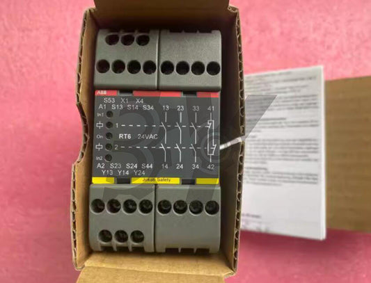 ABB RT6 24VAC Safety Relay. Industrial automation part with terminal connections and Jokab Safety label, inside a box.