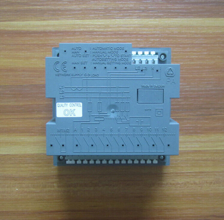 ABB RVC-10 Power Factor Controller, gray control panel with multiple terminals and LCD screen, OK quality control.