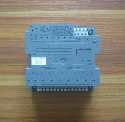 ABB RVC-10 Power Factor Controller, gray control panel with multiple terminals and LCD screen, OK quality control.