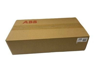 ABB PCD235B1101 controller module in cardboard box. Industrial automation part.