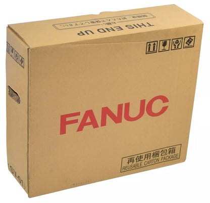 FANUC teach pendant packaging box, "THIS END UP" and "REUSABLE CARTON PACKAGE" labels, industrial automation parts.