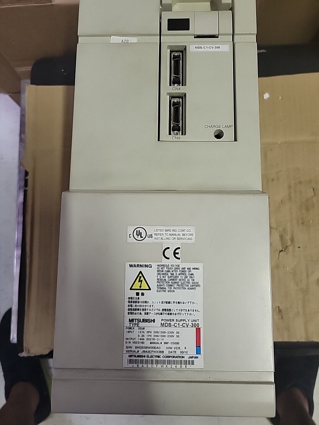 Mitsubishi MDS-C1-CV-300 Power Supply Unit, industrial automation component with warning labels and specifications.