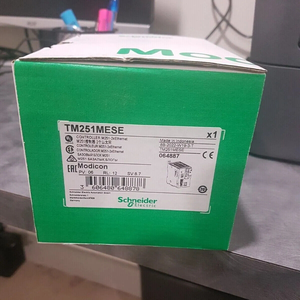 Schneider TM251MESE Programmable Controller box, green packaging, Ethernet ports, industrial automation