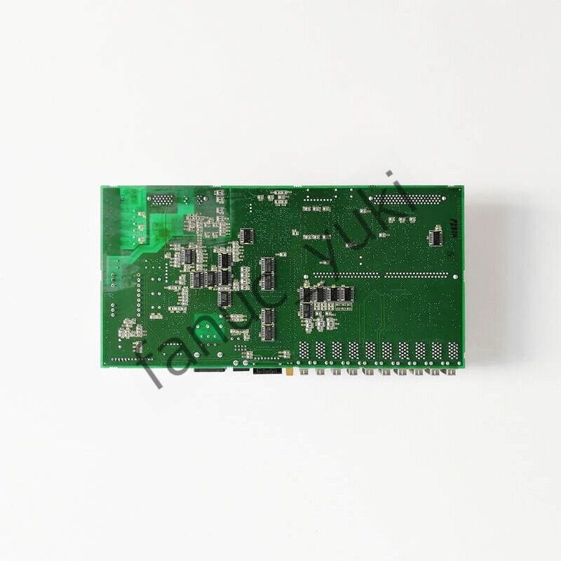 FANUC A20B-2101-0013 PLC circuit board, green electronic component for industrial automation systems.