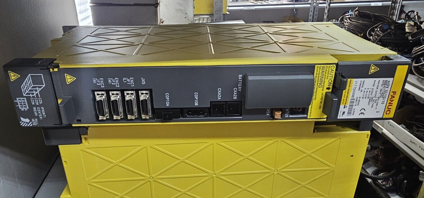 FANUC A06B-6117-H302 Servo Amplifier FS15, industrial automation part with yellow housing and black control panel.